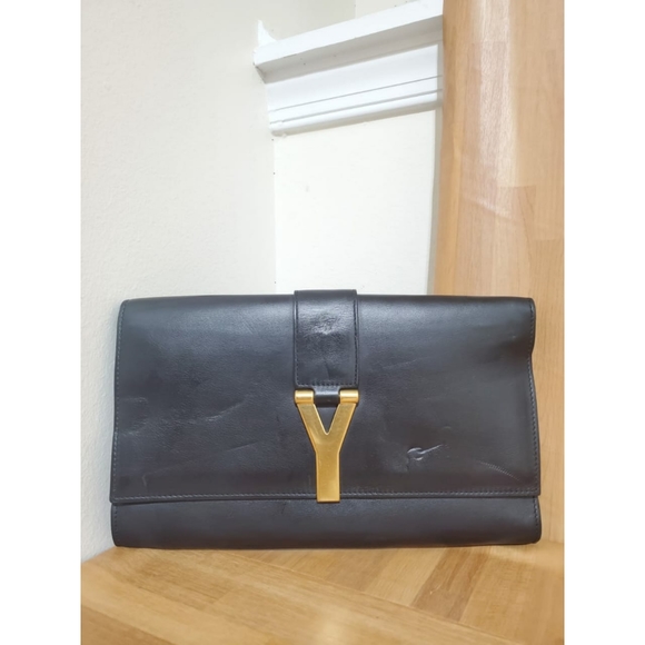 Yves Saint Laurent Handbags - Authentic YVES SAINT LAURENTBlack Leather Ligne Y Clutch Bag